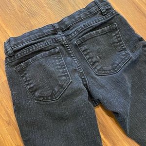 Girls size 10 black skinny jeans.